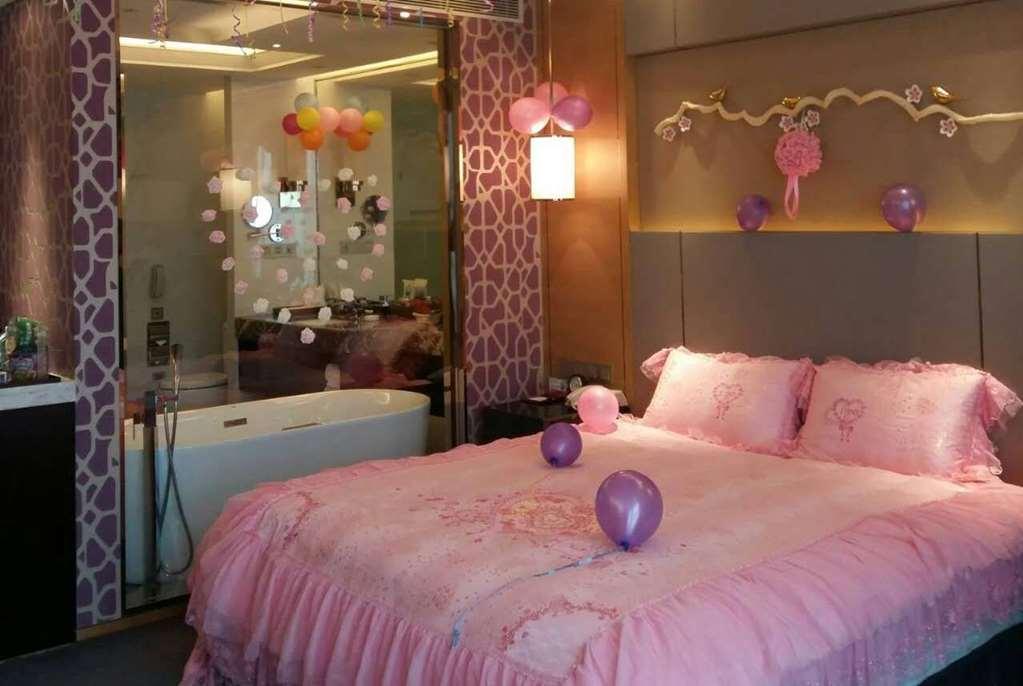 Hotel Ramada Yiyang Taojiang Habitación foto